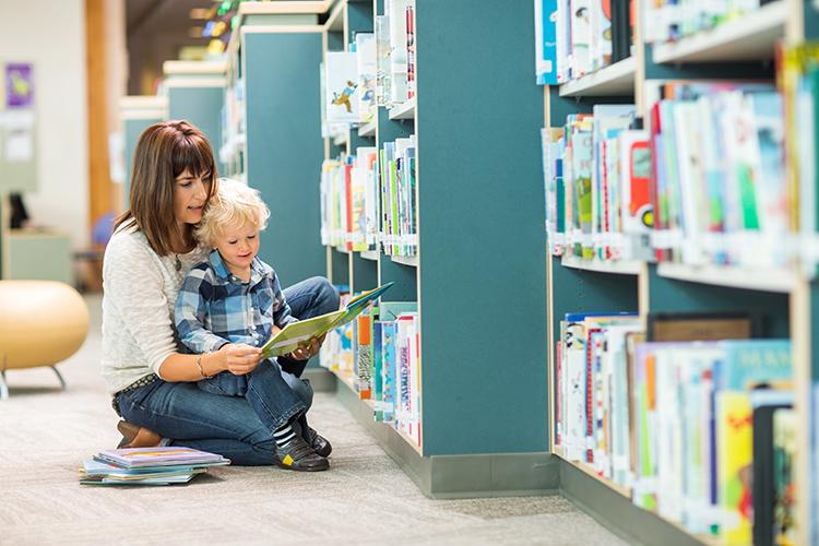 Mom and child browsing books